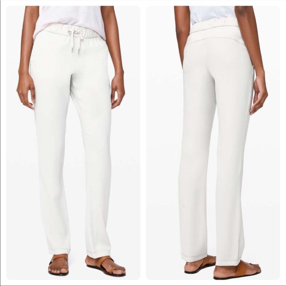 Lululemon On the Fly Pant Woven size 8 inseam 31 Pale Gray